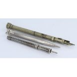 Three propelling pencil related items comprising a Sampson & Mordan & Co., unmarked silver