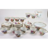 Part Meissen Tea Service to include twelve saucers, twelve cups a sugar bowl and jug and lid and one