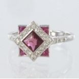 18ct white gold modified cluster ring consisting of central square pink tourmaline surrounded by