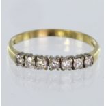 18ct seven stone diamond ring. Size S, weight 2.7g