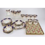 Royal Albert tea set consisting of eight cups, twelve saucers, twelve side plates, a milk jug, two