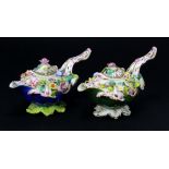 Two 19th Century miniature teapots / milk jugs, with ornate floral decoration, thought to be made by