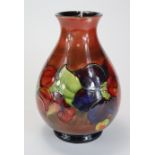 Moorcroft. Rare William Moorcroft 'Flambe Clematis Pattern' Vase (1928-1949).First Quality. Signed