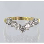 18ct yellow gold wishbone shaped half eternity ring set with seven round brilliant cut diamonds