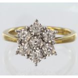 9ct yellow gold diamond daisy cluster ring set with seven round brilliant cut diamonds totalling 0.