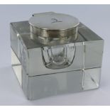 Silver topped glass inkwell, silver part is hallmarked JG&S Birm., 1912, armorial to top of lid,