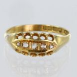 18ct yellow gold boat shaped ring set with five graduated mine cut diamonds calculated as weighing a