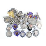 Silver Sporting Medals. A collection of nineteen silver sporting fob sized medals, total weight 5