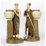 Royal Worcester. A pair of large Royal Worcester figures, by James Hadley, depicting a male and
