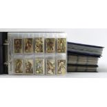 Collection of approx 43 complete sets & 1 part set contained in 4 modern albums, sets from Will's (