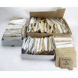 Crate containing large quantity of cards, mainly sorted into various sets in envelopes, issues