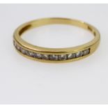 18ct yellow gold nine stone channel set diamond half eternity ring, total diamond weight approx 0.