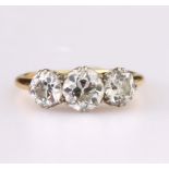 18ct yellow gold ring set with three graduated round brilliant cut diamonds, centre diamond weighing