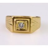 18ct yellow gold square signet style ring set with a single round brilliant cut diamond weighing