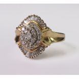 14ct yellow gold fancy diamond cluster ring featuring a central marquise cut diamond surrounded by