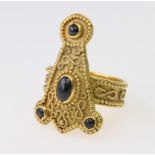 22ct yellow gold ring of abstract design set with four oval and round cabochons, finger size P,