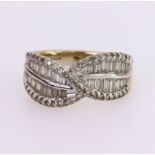 18ct white gold dress ring set with twenty eight graduated baguette cut diamonds with a further