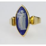 18ct yellow gold ring set with an elongated marquise shaped porcelain cameo depicting a Grecian lady