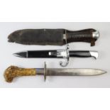 Daggers - including unusual bone grip example, modern issue dagger and MK 3 commando dagger. (3)