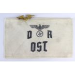 German Nazi Armband German railways east dated 1943 with small badge.