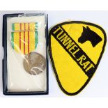 Vietnam interest a "Tunnel Rat" shoulder badge and Vietnam USA service medal, mint boxed