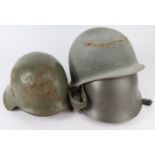 Helmets, three post WW2 examples including US pattern.