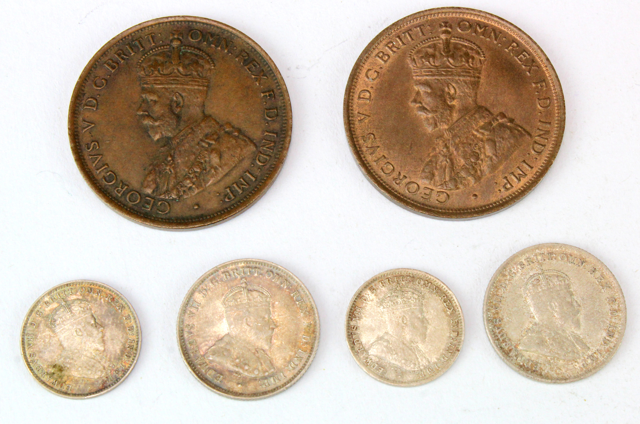 Australia (6): Pennies: 1911 GEF with lustre, ditto VF; Threepences: 1910 EF tone spot, ditto