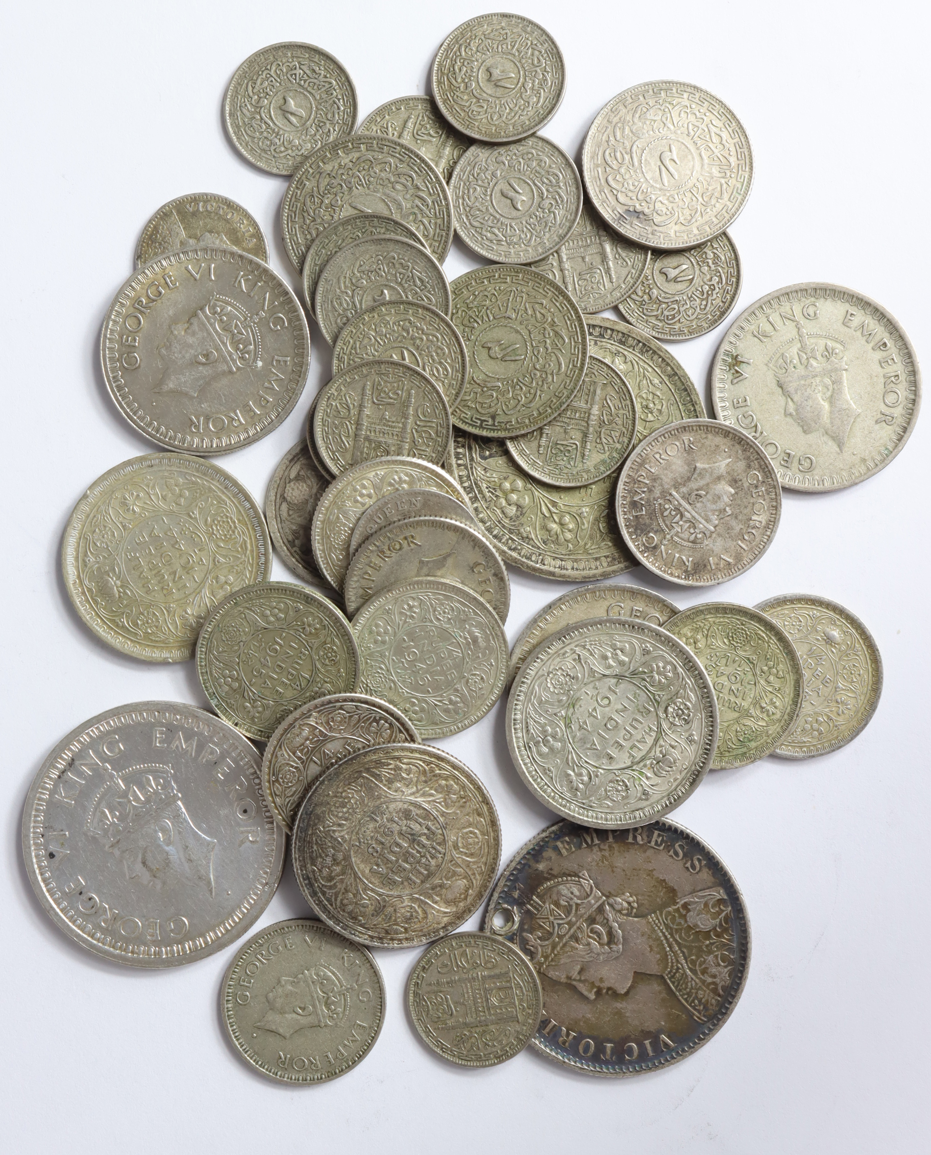 Indian silver coins (39) 19th-20thC including Hyderabad, mixed grade.