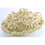 Belleek. Large oval Belleek woven lattice work basket with cover. Decorated in sharmrocks, roses and