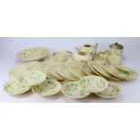 Belleek. Matched part tea service in shamrock pattern to include ten side plates, six saucers, a