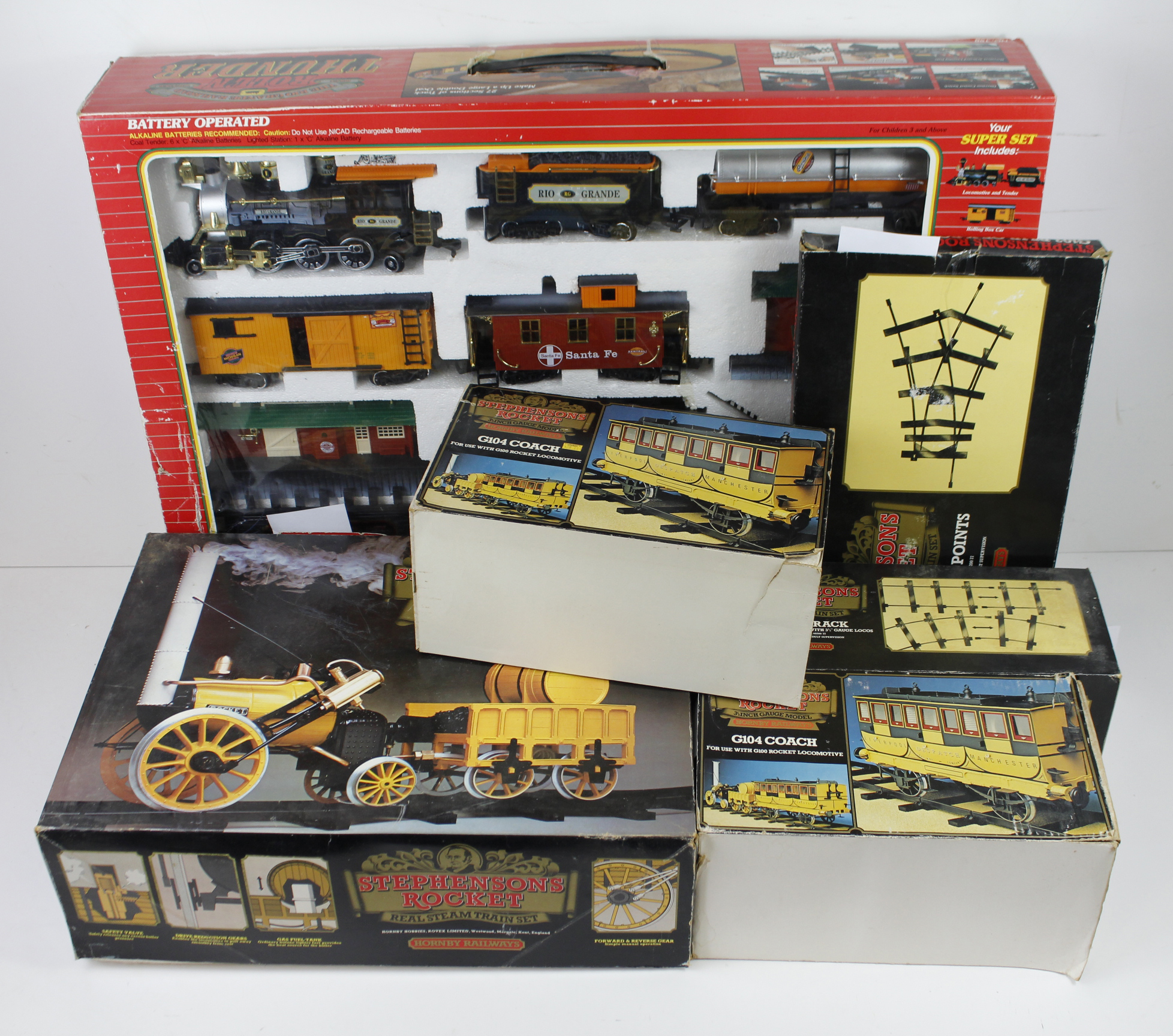 Hornby Stephensons Rocket, boxed, together with two boxed Hornby G104 coaches, a boxed set of points