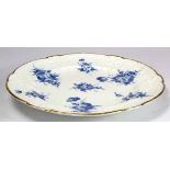 Nantgarw porcelain plate with embossed borders, with blue floral decoration & gilt rim, impressed