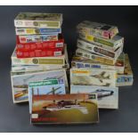 Model kits. A collection of approximately twenty aircraft and tank model kits, by Airfix, Revell,