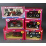 Britains. Five boxed models, comprising Case IH Magnum 310 Tractor (42113); Ford FW-30 Tractor (