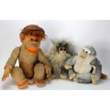 Monkeys - Three soft toy monkeys, two modern and one straw filled example circa.1970.