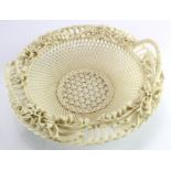 Belleek. Three strand basket with floral decoration to rim, (repair to handle).