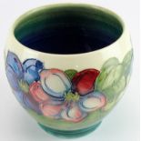 Moorcroft jardiniere in 'clematis' pattern 13.5cm high, signed to base.