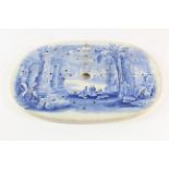 Transferware interest- A blue and white drainer depicting columns and ruins within middle eastern