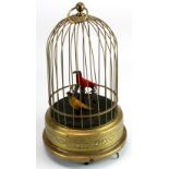 Clockwork Automaton depicting a bird cage with two singing birds on perches, circa early 20th