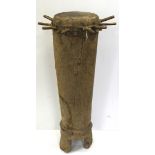 Tribal interest. A large upright tribal drum, circa early 20th Century, height 114cm approx. (