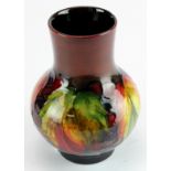 Small leaf and berry Moorcroft flambe vase impressed 'Moorcroft' to base and another impressed mark,