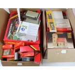 Railway. Two boxes of mostly boxed railway models, including sheds, turntable, etc., makers