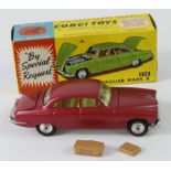 Corgi Toys, no. 238 'Jaguar Mark X' (cerise), suitcase in boot, contained in original box