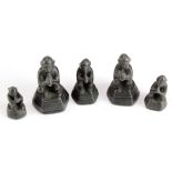 Five bronze graduating opium weights, depicting seated monkeys, largest 50mm approx.