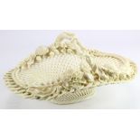 Belleek. Basket with handle decorated with flowers at either side of handle and a three strand