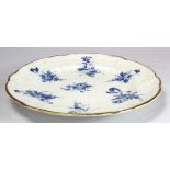 Nantgarw porcelain plate with embossed borders, with blue floral decoration & gilt rim, impressed