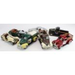 Seven diecast Franklin Mint and Ertl Collectibles scale models, including 1954 Mercedes Benz, 1947