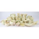 Belleek. Collection of shamrock wares to include, five vases, five covered dishes, three smaller