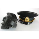 Russian interest. A Russian flying helmet, dated 1969, together with a Russian Naval peaked cap