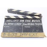 Holiday on the Buses interest. An original clapperboard for the 1973 film 'Holiday on the Buses',